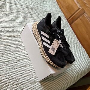 Adidas Men’s Black and White Sneakers Size 11.5